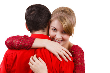 Girl hugging boyfriend romantically.