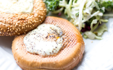 bagels and eggs with salad