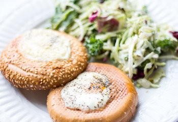 bagels and eggs with salad