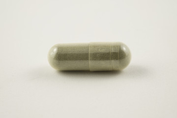 pill or drug capsule on white background