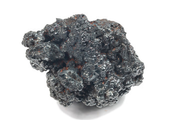 detailed macro photo of Hematite mineral (sacred mineral) isolated over white
