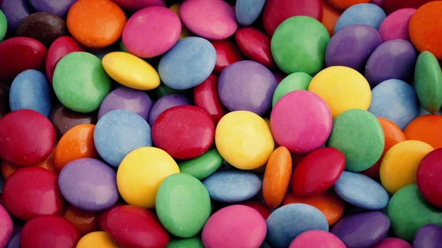 Sugar Coated Chocolate Candies Rotating