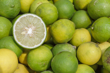 Sliced limes. Green lime citrus fruit. Fresh juicy limes.