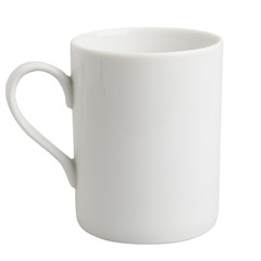 White ceramic mug isolated on a white background