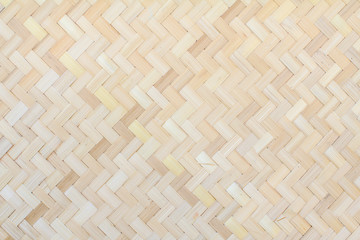 Closeup brown bamboo weaving texture, Woven wood pattern of thai