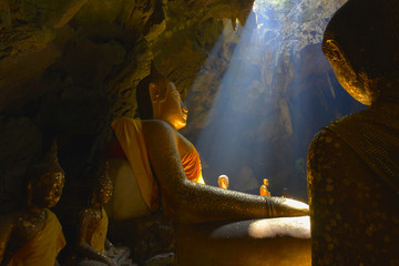 Amazing Buddhism with the ray of light in the cave