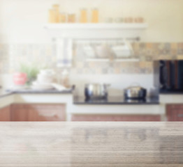 Fototapeta na wymiar granite table top and blur of modern kitchen interior as background