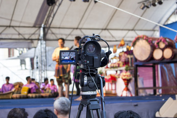 Obraz na płótnie Canvas Video camera, scene on background, making video
