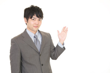 案内するビジネスマン