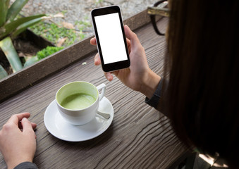 woman holding and using smart phone with white blank empty scree