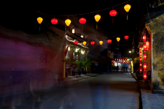Night view of a street in Hoi An, Vietnam. Hoi An is the World's Cultural heritage site, famous for mixed cultures and architecture.