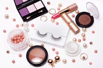 Set of decorative cosmetics white background. Top view