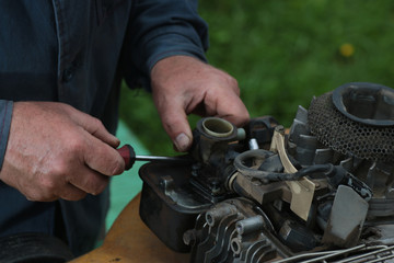 repairing lawn mower engine