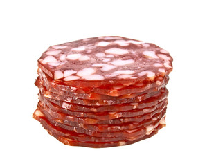 Stack of salami slices isolated on a white background