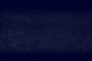 glitter vintage lights background. blue, silver and black. defocused.
