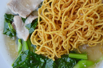 crispy yellow noodle dressing gravy sauce on plate