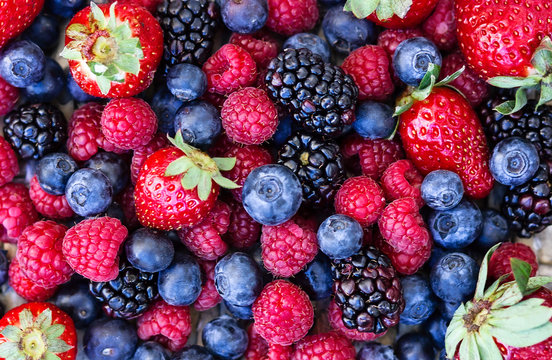 Group of blueberries, raspberries, blackberries and strawberries