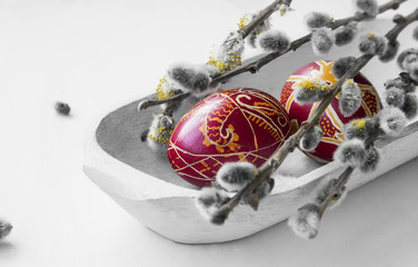 Painted Easter eggs with spring buds branches