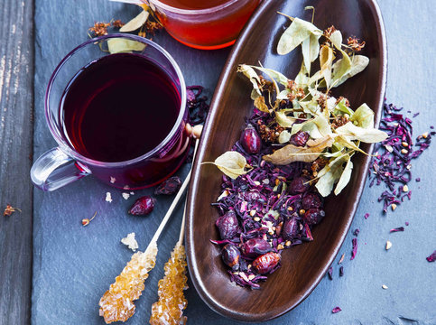 Hibiscus,linden And Rosehip Red Tea Cup With Dried Tea Leaves An