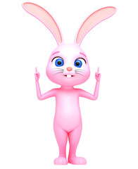 3D illustration. Cheerful rabbit pointing finger on a white back