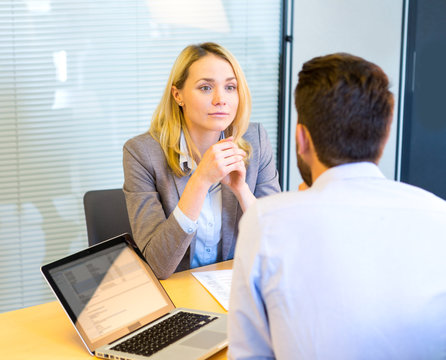 Young attractive woman during job interview