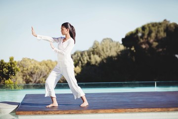 Fototapeta na wymiar Calm brunette doing yoga