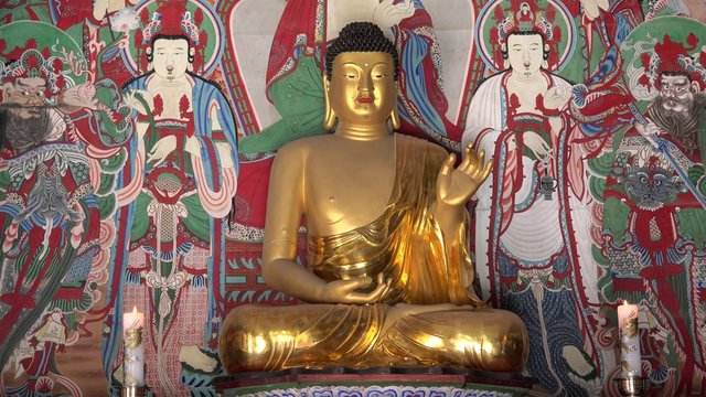 Gilt seated Amitabha Buddha statue in Geungnakjeon Hall of the Bulguksa Temple. Gyeongju