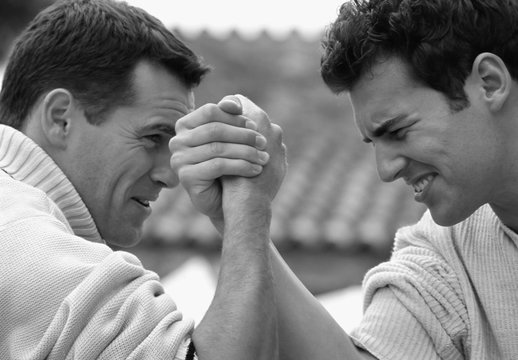 Men arm-wrestling