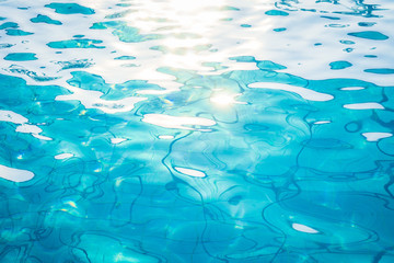 Blue swimming pool rippled water detail