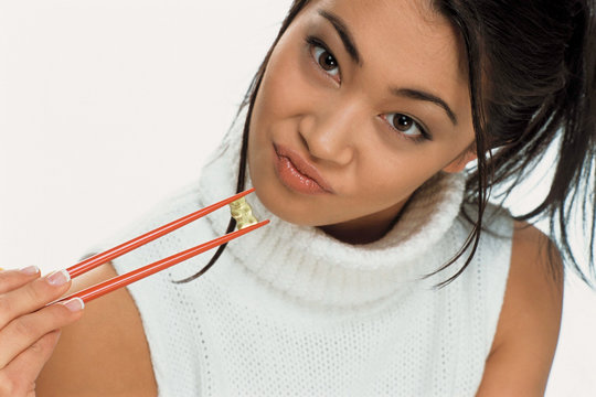 Young woman eating sweets