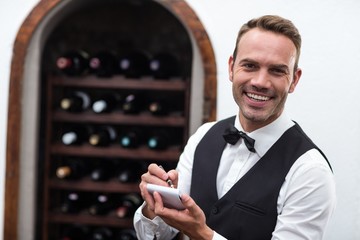 Waiter taking an order