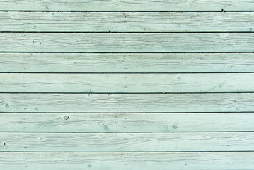 Section of pale green wood panelling from a seaside beach hut. Could be used as a background to illustrate beach and summer holiday themes. Also garden themes.

 - obrazy, fototapety, plakaty