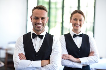 Waiting staff smiling at camera
