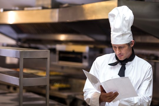 Handsome Chef Reading Menu