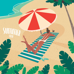 Nice girl in white swimsuit sunbathing on striped beach mat under a colorful parasol on the beach - Passive vacation or relaxation concept © ariadnas