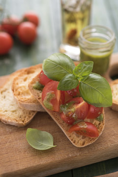 Homemade bruschetti with pesto