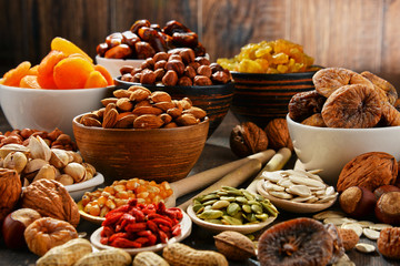 Composition with dried fruits and assorted nuts