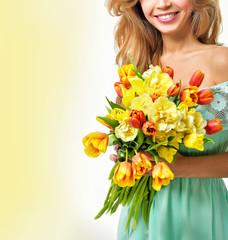 Woman with Spring Flower bouquet. Happy surprised model woman. M