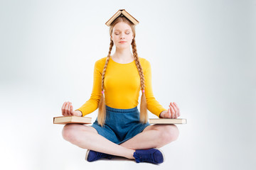 Female student meditating