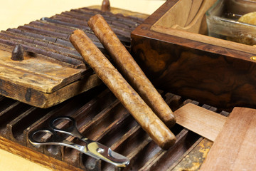 Cigars with wooden box, and tools for cigar preparation
