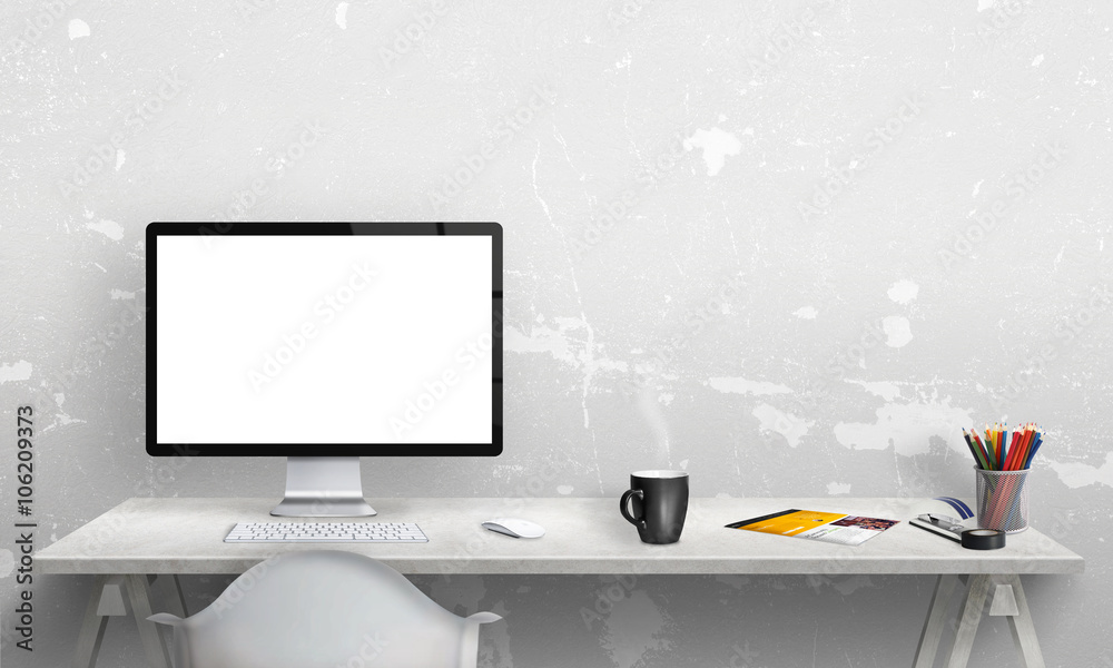 Poster Isolated computer display for mockup in office interior. Work desk with keyboard, mouse, cup of coffee, paper, pencils. Free space on wall for text.