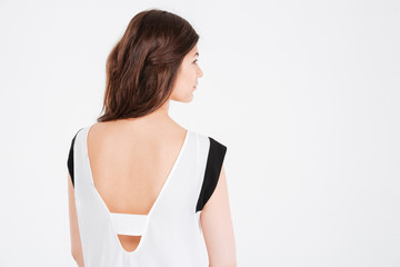 Attractive young woman in blouse with a deep neckline