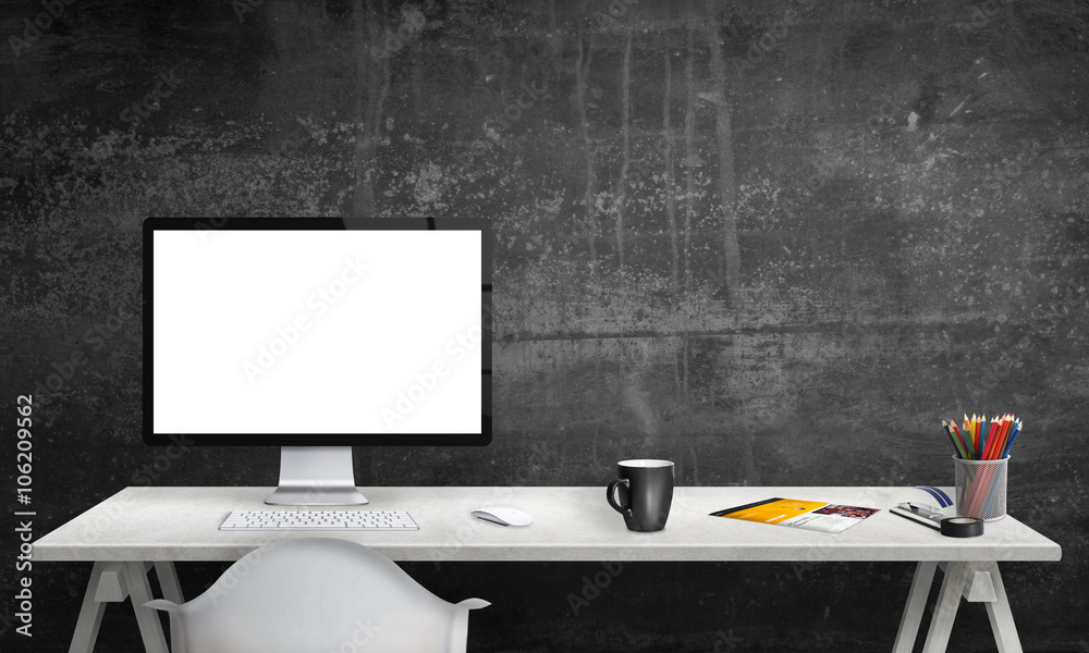 Poster Isolated computer display for mockup in office interior. Work desk with keyboard, mouse, cup of coffee, paper, pencils. Free space on wall for text.