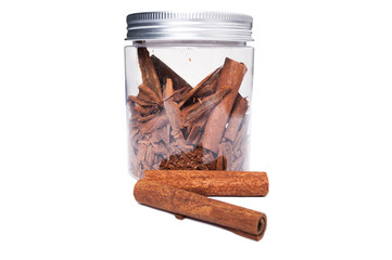 Cinnamon sticks in transparent plastic jar