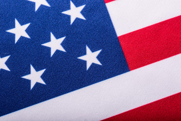 USA flag. American flag. American flag blowing wind. Close-up. Studio shot.