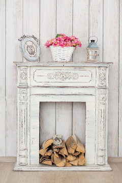 Vintage White Fireplace With Firewood