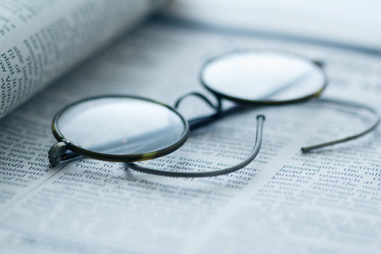 Vintage Spectacles On Book