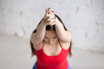 Fototapeta premium Yoga indoors: Virabhadrasana 1 Pose