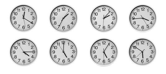 Collage of round wall clocks, isolated on white