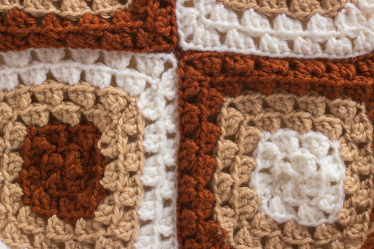 Macro background pattern of woolen thread crocheted